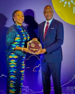 Adeniyi receiving award
